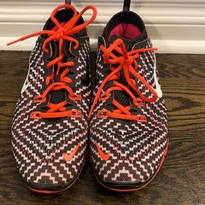 Black and  coral Nike athletic sneakers size 8